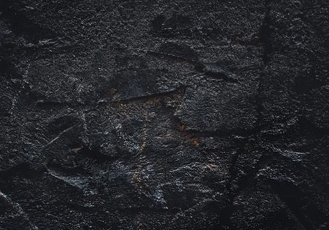 Rock surface with cracks. Black texture. Stone background. Dark marble. Rock  Stock Photos