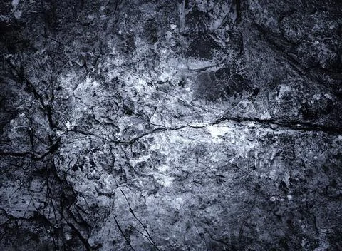 Rock surface with cracks. Rock texture. Silver Wall. Rock background. Black t Stock Photos