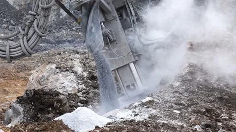 Rock surface drilling machine used to drill blast holes at quarry site Stock Footage 115483372