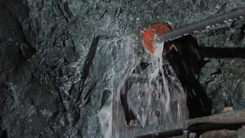 Rock surface drilling machine used to drill blast holes at mine tunnel Video stock 121750313