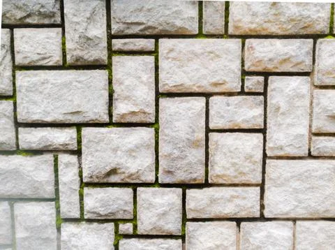 Rock texture background on a wall which have cuts on it. Stock Photos