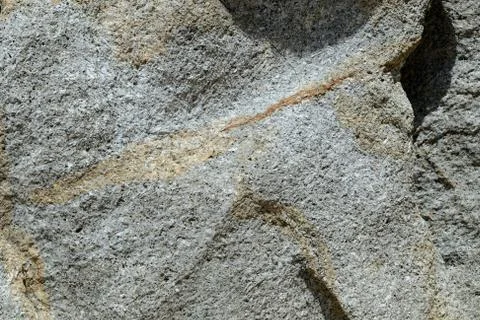 Rock texture close up. Stone background Stock Photos