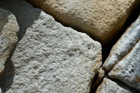 Rock texture close up. Stone background Stock Photos