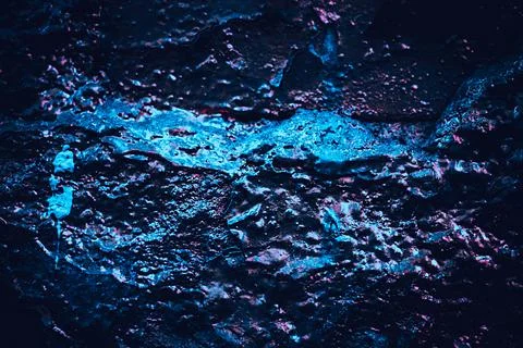 Rock texture. Dark stone wall. Stone background. Rock surface with holography Stock Photos
