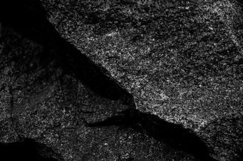 Rock texture. The surface of the stone is like a wall. White gray grunge Stock Photos