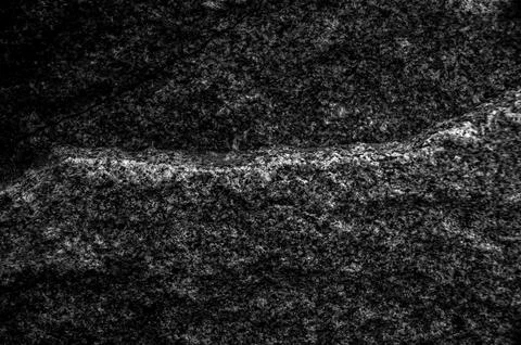 Rock texture. The surface of the stone is like a wall. White gray grunge Stock Photos