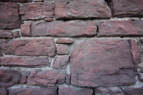 A rock textured background of different sizes from a wall in the old mining t Stockfoto's