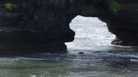 Rock with a tunnel Stock Footage 72469749