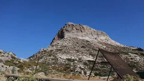 A rock viewed from the window of a car in motion. Stock Footage 197376691
