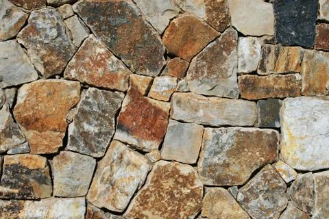 Rock wall background Stock Photos