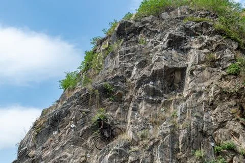 Rock wall with security and agent dummy 写真素材