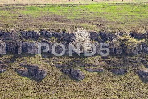 Rock wall of Smotrych River canyon in Kamianets Podilskyi, Ukraine Stock Photos