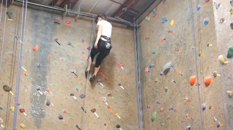 Rock Wall woman (14sec) Stock Footage