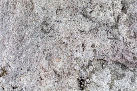 A rock with a white surface and a red dot in the middle Stock Photos