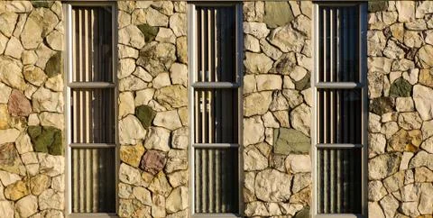 Rock windows wall Stock Photos