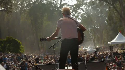 ROCKER IN FRONT OF CROWD Stock-Footage 12284094
