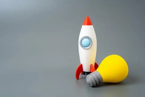 Rocket and light bulb. Startup ideas and technologies. Launch of innovative t Stock Illustration