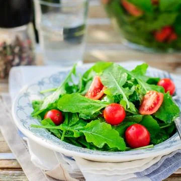 Rocket (Arugula) and Cherry Tomato Salad Stock Photos