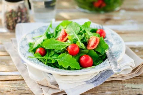 Rocket (Arugula) and Cherry Tomato Salad Stock-Fotos