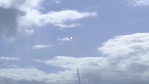 Rocket Ascending Into Cloudy Blue Sky With Exhaust Trail, Space Exploration Stock Footage 329969826
