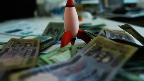 Rocket with Bangladeshi Currency Notes, A rocket surrounded by various deno.. Vídeos de archivo 304961373