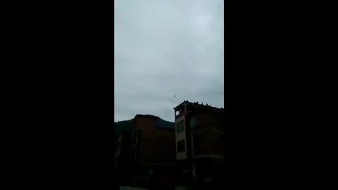 Rocket debris from Chinese space launch crashes near houses Stock Footage 106315752