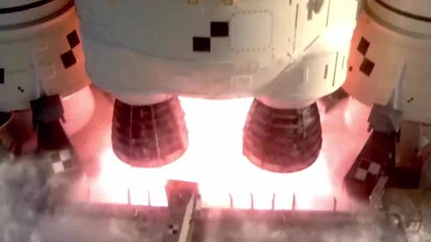 Rocket engines igniting with intense fire during a space mission launch. Stock Footage 333795865