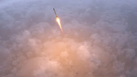 Rocket flies through the clouds Stock Footage 120599145