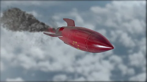 A rocket is flying in the sky. Flag of China. Weapons of mass destruction. Blurr Stock Footage 147386879