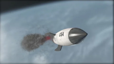 A rocket is flying in the sky. Flag of Usa. Weapons of mass destruction. Blurred Stock Footage 147389551