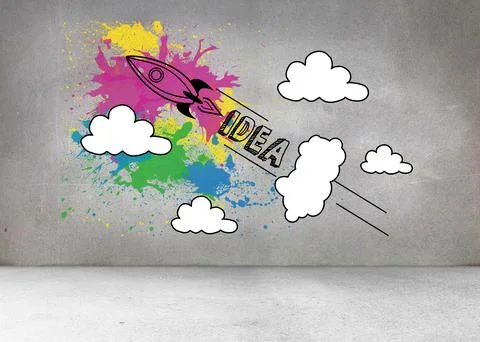 Rocket labeled IDEA is blasting off through colorful splatters and clouds in Stock Illustration