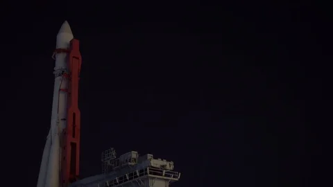 Rocket on the launch pad. Night. Review bottom up and back down. UltraHD footage Stock Footage 106355604