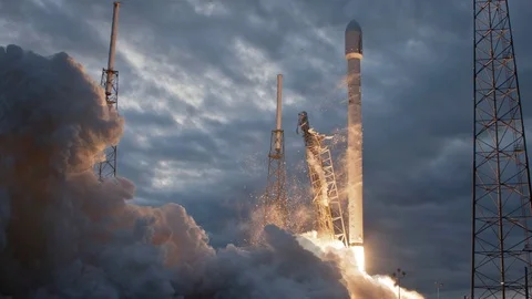 Rocket launching into space from launch pad Cinemagraph Stock Footage