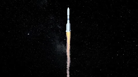 Rocket launching into starry night sky with bright flames Stock Footage 327345179