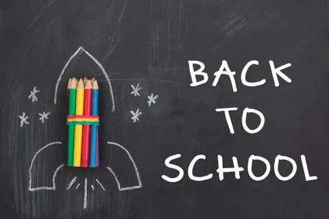 Rocket made from pencils on chalkboard with the text Back to School Stock Photos