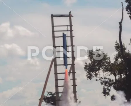 Rocket rising into the sky at a local tradition of Thailand. Stock Photos