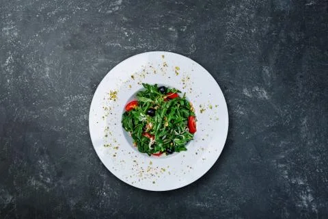 Rocket salad with cherry tomatoes Stock Photos