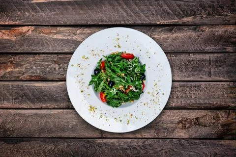 Rocket salad with cherry tomatoes Stock Photos