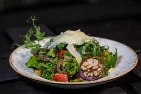 Rocket salad with parmesan cheese Stock Photos