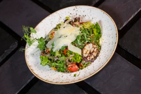 Rocket salad with parmesan cheese Stock Photos
