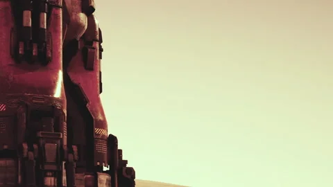 Rocket standing on a barren landscape with a clear sky above Stock Footage 344889153