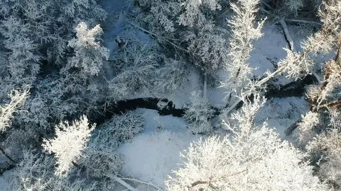 Rocket View of Small Winter Creek Stock Footage 100688758