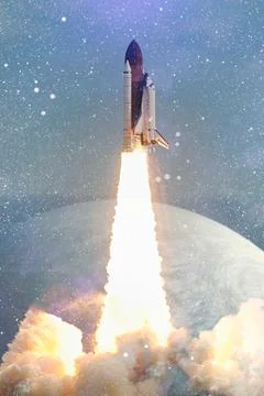 Rockets launch into space on the starry sky. spacecraft flies into space with Stock Photos