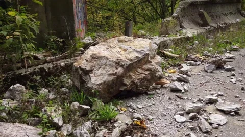 Rockfall on a road in the mountains. Stock Footage 169653680
