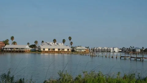 Rockport TX Drive 8 sec houses along water 4k Stock Footage