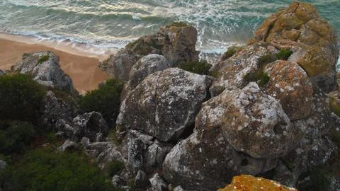 Rocks above the beach. Stock Photos