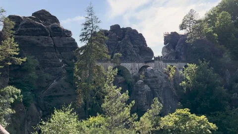 Rocks against a backdrop of lush greenery Stock Footage 303896739
