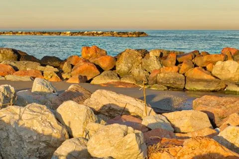 Rocks along pier Stock Photos