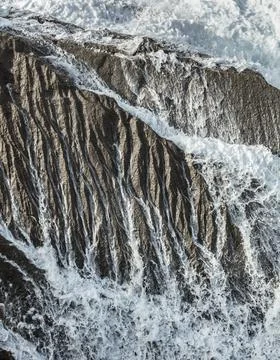 Rocks among the waves Stock-Fotos