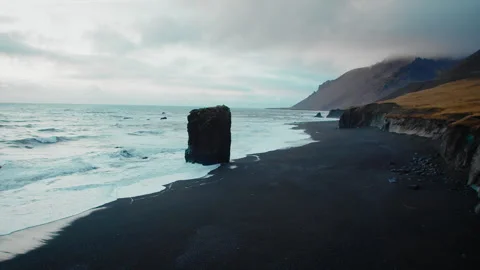 Rocks and Black Sand on Pristine Beach, Coastline of Iceland, Stock Footage 260896374